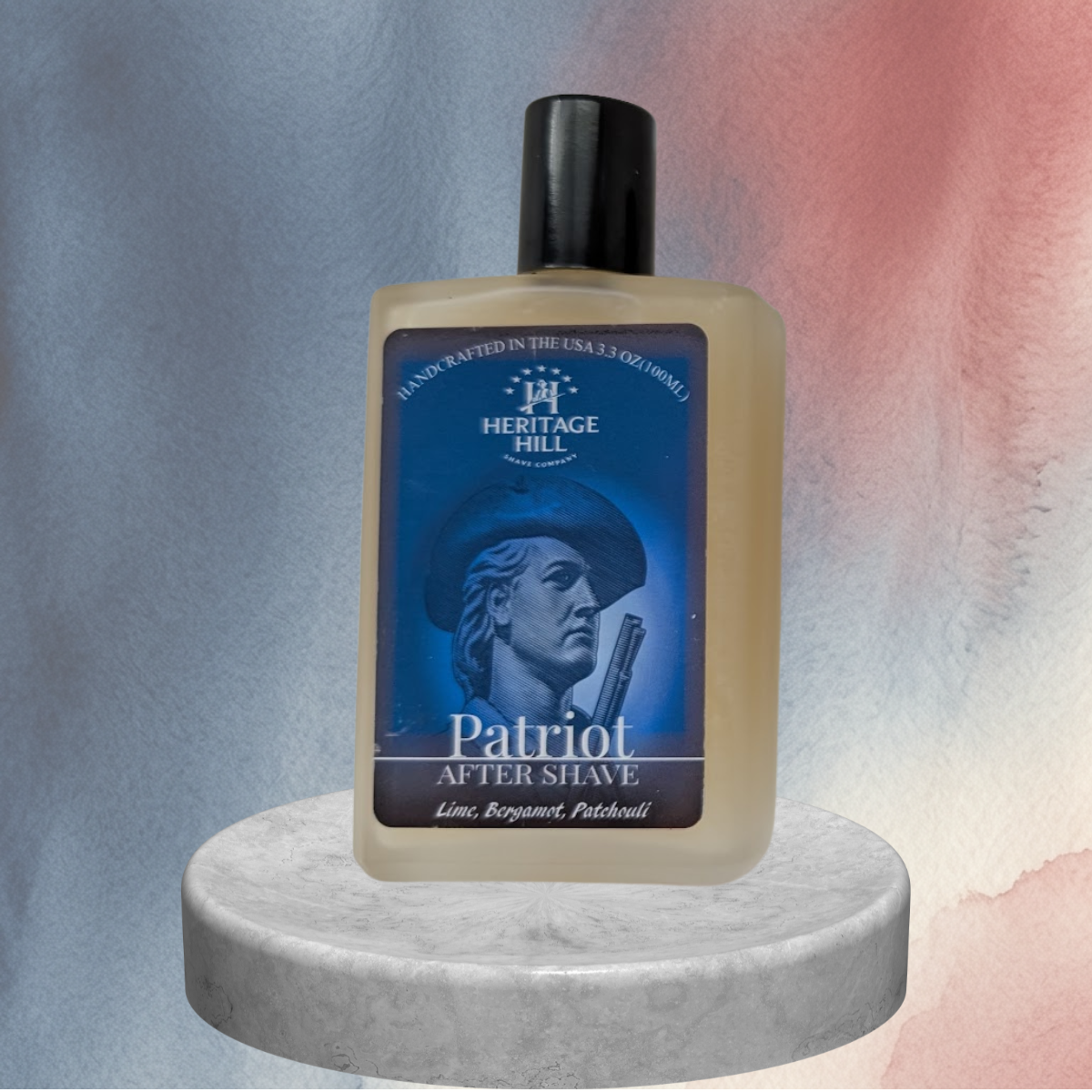 Bottle of Heritage Hill Patriot After Shave on a round stone platform with a gradient background