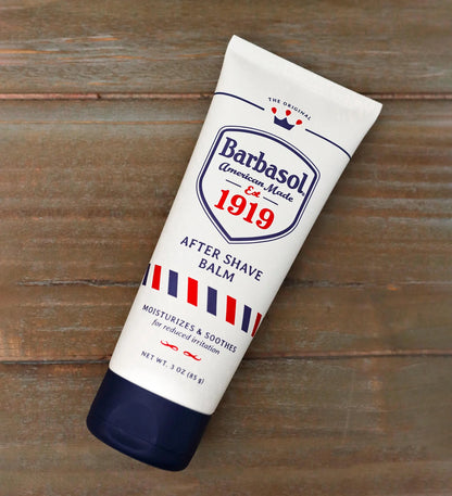 Barbasol after shave balm tube on a wooden surface