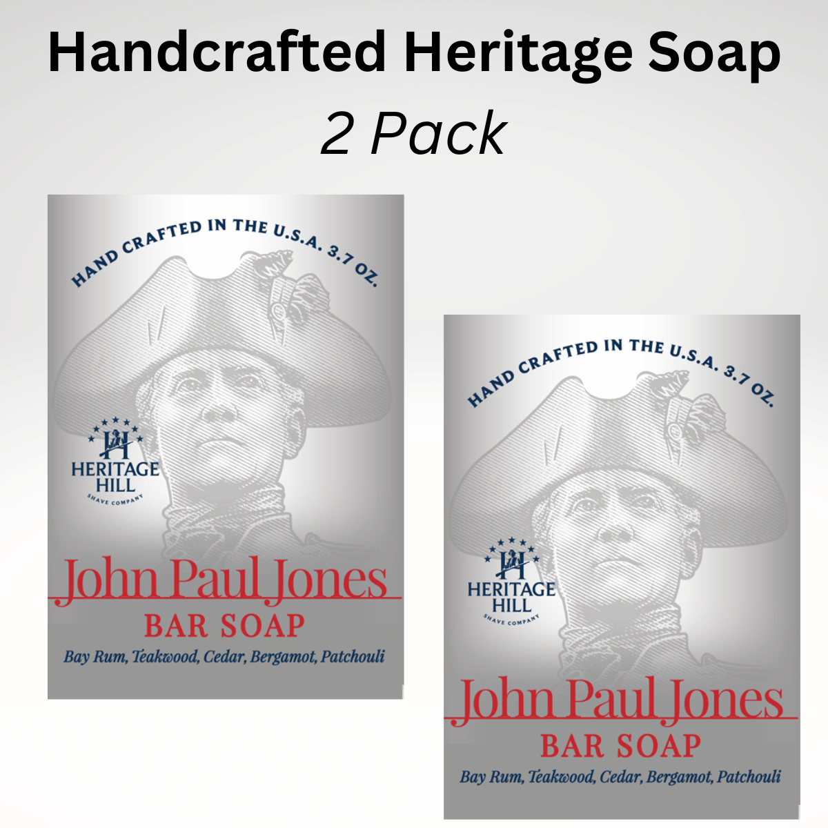 Two bars of soap with packaging that features patriotic themes. One is labeled 'Patriot Bar Soap' with a illustration of a man's profile in a hat, and the other is labeled 'John Paul Jones Bar Soap' with a similar illustration in a grey scale.