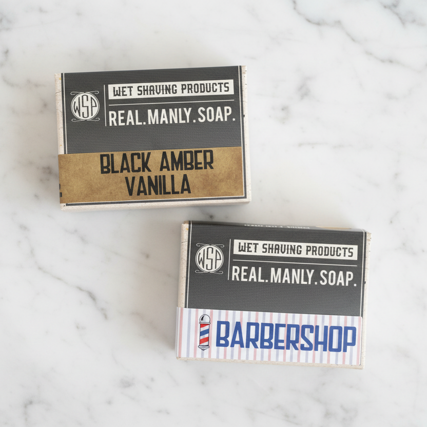 Two packages of Wet Shaving Products Real Manly Soap with different scents on a white background.